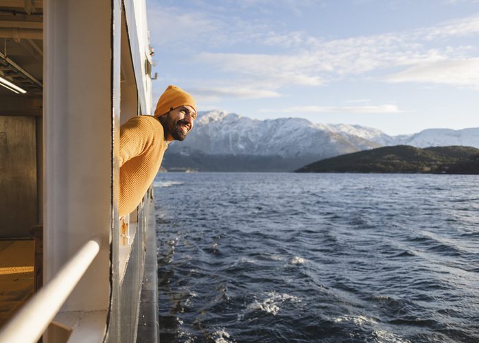 Man enjoying ocean view from ferry